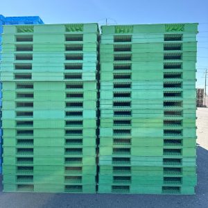 Used 44 x 56 Green Stackable Pallets